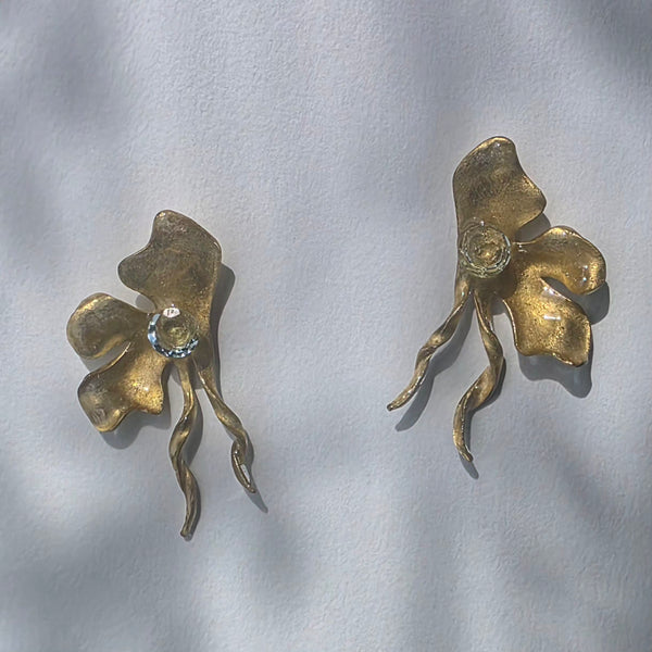 Aros Flor deconstruida con topacio azul